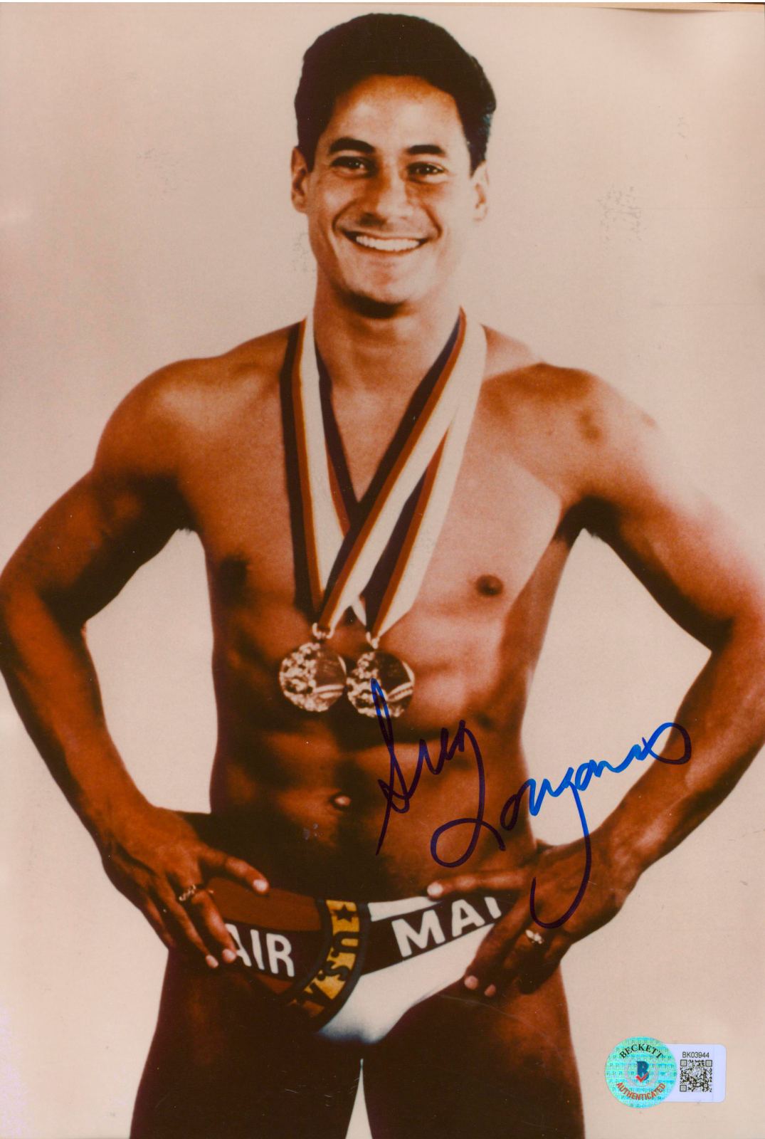 
Greg Louganis Summer Olympics Authentic Signed 6.5x9.75 Photo BAS #BK03944